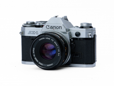 Canon AE1+50/1,8 gebraucht #9171898 - 9171898 Canon AE1+50/1,8 gebraucht #9171898